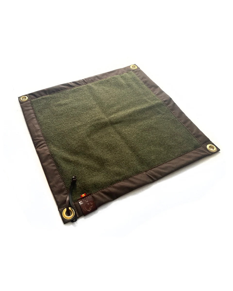 Brown oilskin camp mat with green wool lining