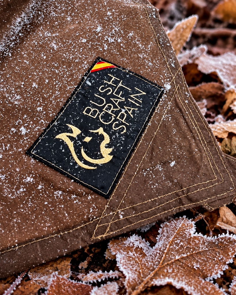 Bushcraft Spain black nylon patch on frosted brown oilskin